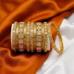 14 Pieces Gold Colored with White stone Bangles