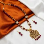 Maroon and Gold Maala with Earrings