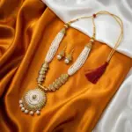 Gold design With White Beads Maala and Earrings