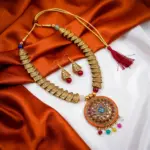 Gold colored Maala and Earrings