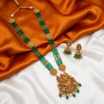 Traditional Antique Gold Lakshmi Pendant Multi-Layer Green Beads Haram Necklace Set with Matching Jhumkas