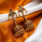 Traditional Antique Gold Jhumka Earrings with Ruby and Green Stones