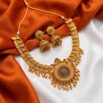 Traditional Gold Finish Peacock Motif Necklace Set with Matching Jhumkas