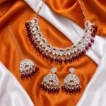 Royal Maroon Kundan & Pearl Choker Set with Maang Tikka