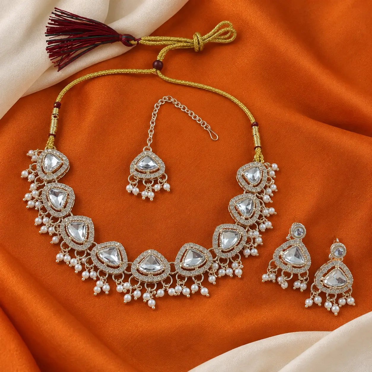 a_close_up_studio_product_photo_of_a_jewelry_set_l.png Clear Stone Pearl Drop Necklace Set with Earrings & Tikka