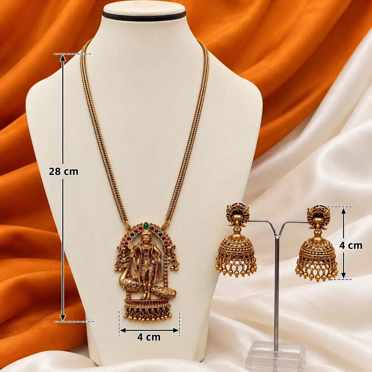 a_clean_product_photography_scene_with_measurement.png Antique Gold Temple Deity Long Necklace & Jhumka Set – image 3