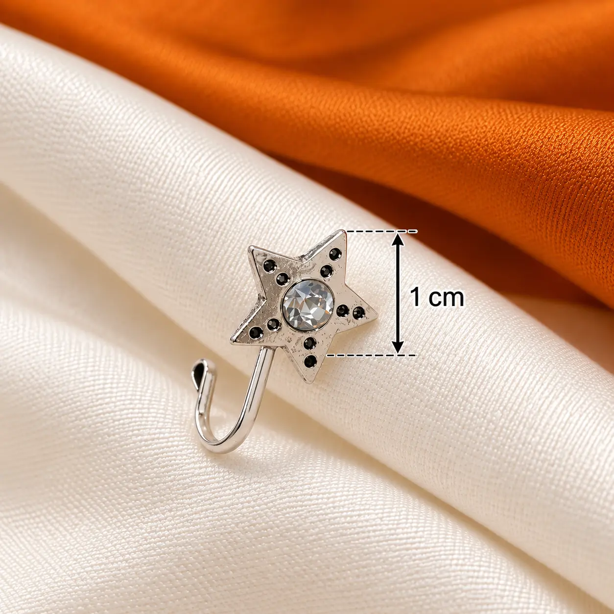 close_up_product_photography_scene_of_a_small_star.png Silver-Tone Star Nose Pin with Clear Centre Stone – image 3